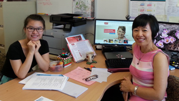Dr Frances Lin in her office at Griffith University with Peking University visiting PhD student Yaya Wang.