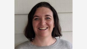 Profile photo of Dr Amy Young. She is smiling and looking at the camera.