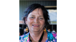 Profile photo of Dr Kerry Hall. She is smiling and looking at the camera.